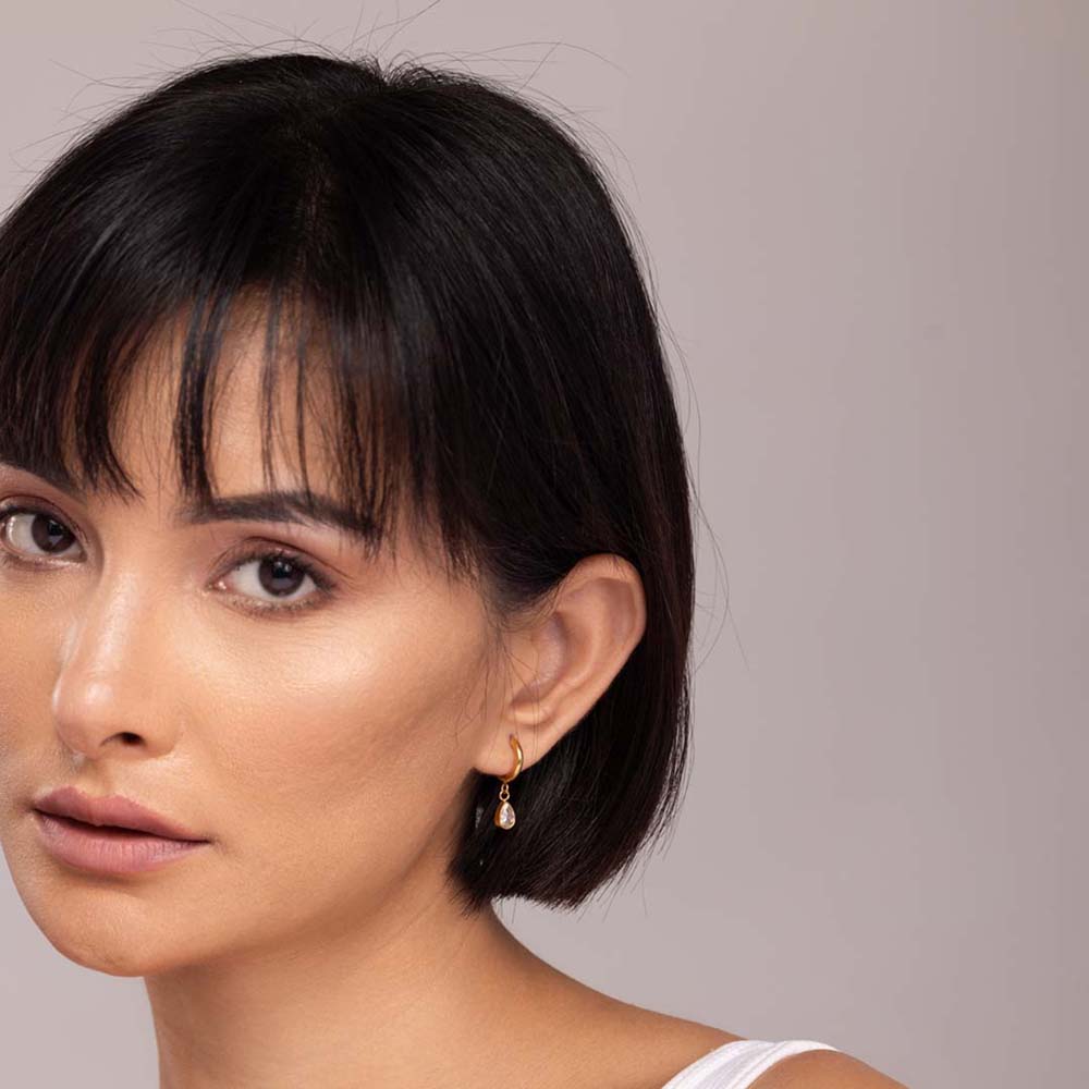 Solitaire drop hoop earrings