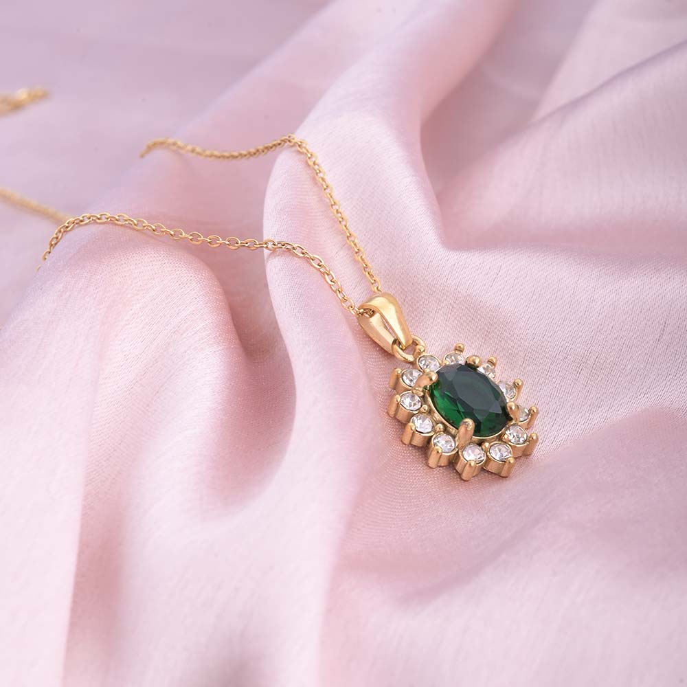 Green sapphire and diamond halo pendant