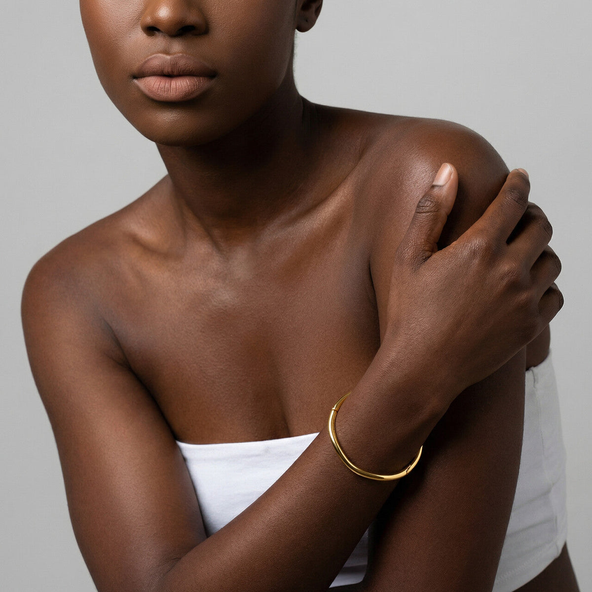 Gilded oval bangle bracelet